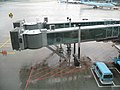 Note outboard gantry and driving wheels on a jet bridge at Incheon Airport, South Korea