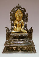 The Buddhist Goddess Tara, gold and silver, Central Java, Indonesia, c. 9th century.[70]