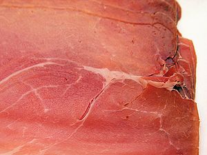 Prosciutto hams also get their pink color from salt combined with the natural protein called myoglobin.