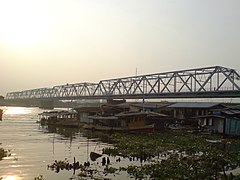 The Rama VI Bridge, the first bridge to cross the Chao Phraya River, opened in 1927