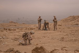 Marine M252 mortar crew deploying on a cliff-side in the Middle Euphrates River Valley in Syria, 11 October 2018