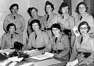 Bell seated at a council meeting of the Women's Air Training Corps