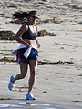 Beach runner in sports bra