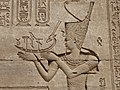Emperor Trajan as a Pharaoh making an offering to the Gods, in Dendera.[20]