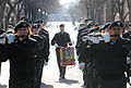 United States Army Staff Sgt. Brian L. Barnhart, a snare drummer with the United States Army Old Guard Fife and Drum Corps, trails the ensemble down Sheridan Avenue on Fort Myer during a January 9, 2009 rehearsal for then President-elect Barack Obama's upcoming inaugural parade.