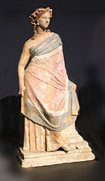 Greek figurine of a beautifully dressed young woman, 3rd of 2nd century BC, terracotta with kaolin and traces of polychromy, Liebieghaus, Frankfurt, Germany[15]
