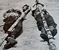 Two corpses and a severed head belonging to guerrillas killed by the Queen's Own Royal West Kent Regiment.