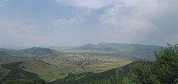 The northern part of Armenia's northern province of Lori as seen from Pushkin Pass. Visible in this picture is the village of Agarak (background, right)