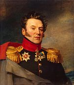 Painting shows a clean-shaven, square-faced man with blowing hair and long sideburns. He wears a dark green military uniform with gold epaulettes and several medals. An overcoat is thrown over his right shoulder.