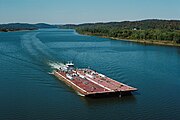 Towboat Ben McCool upbound on Ohio River at Matthew E. Welsh Bridge with two tank barges (1 of 6), near Mauckport, Indiana, USA, 1987