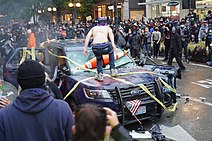 A vandalized police car during a riot in Seattle on May 30, 2020