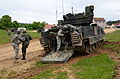 Albanian and US soldiers dismounting a M2 Bradley during Combined Resolve II