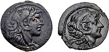 Two coins. Obverses are shown. To the left, a coin of Alexander I depicting him wearing a headdress in the shape of a lion head. On the right, a coin of Alexander II depicting him wearing the same headdress