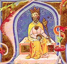 A bearded man sitting on a throne wearing a crown
