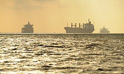 Cargo ships awaiting entrance into Galveston Bay