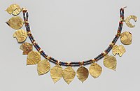 Headdress decorated with golden leaves; 2600-2400 BC; gold, lapis lazuli and carnelian; length: 38.5 cm; Metropolitan Museum of Art