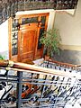 Casa Guazzoni, staircase and door of an apartment