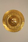 Face-shaped plaque; 7th–12th century; gold; diameter: 1.9 cm (35⁄8 in.); Metropolitan Museum of Art