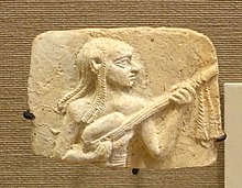 a clay plaque in relief