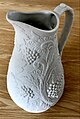 A Portmeirion Parian Ware ewer (circa 1987) decorated with a low-relief, grapevine pattern