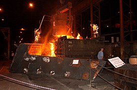 Steel from the World Trade Center is poured for construction of USS New York