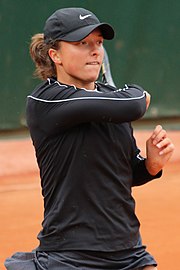 Iga Świątek, the 2023 women's singles champion. It was her fourth major title and her third at the French Open.