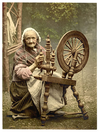 A photochrom of an elderly Irish woman using a spinning wheel, County Galway, Ireland, c. 1890s