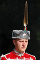 Headgear: kalpak with eagle feather and Alexander star