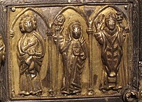 Lower right hand panel, with an abbess and two clerics or saints, possibly the three Irish patron saints, Columba, St Brigid and St Patrick.[24]