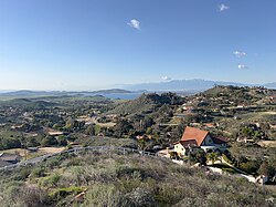 View of Lake Mathews community, Lake Mathews reservoir, and San Gabriel Mountains