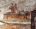 A female and two males on a wall painting from the suburban baths. Pompeii. 62 to 79 CE