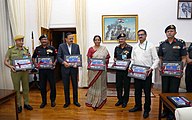 Union Minister for Defence releasing a Border Roads Organisation (BRO) Coffee table book 'Will of Steel', in New Delhi. NSA also present.