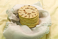 Salvadoran tortillas are a staple of the Salvadoran diet. These are thicker (5 mm) than Mexican tortillas, about 10 cm in diameter.