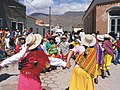 Women wearing aguayos while dancing the Carnavalito in Jujuy, Argentina