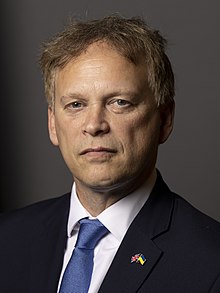 Shapps wearing a suit