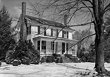 A black and white photograph of a two-story colonial home formerly belonging to Francis Nash and, after Nash's death, to William Hooper