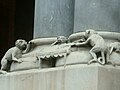 Decorative carving of monkeys playing billiards