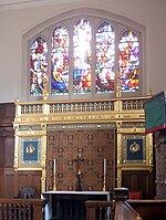 Altar in the south aisle of the Chapel