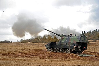 German soldiers with 4th Battery, 131st Artillery Battalion carry out a fire mission with self-propelled howitzers