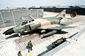 A McDonnell Douglas F-4D Phantom II aircraft moving into a revetment made from profiled steel panels at Kunsan Air Base, South Korea
