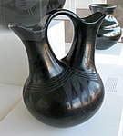 Maria and Julian Martinez matte-on-glossy blackware wedding vase, c. 1929, collection of the Fred Jones Jr. Museum of Art