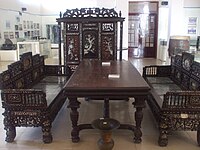 Mother of pearls inlaid furniture set in An Giang Museum, Vietnam.