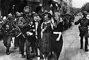 Women greeting German soldiers in Riga
