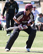 Craig Kieswetter, wearing a maroon Somerset cricket kit, batting