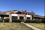 EF1 damage example--EF1 tornadoes cause major damage to mobile homes and automobiles and can cause minor structural damage to well-constructed homes. This frame home sustained major roof damage, but otherwise remained intact.