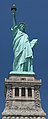 The Statue of Liberty (formally Liberty Enlightening the World) holds a tabula ansata inscribed with "July 4 1776" in Roman numerals