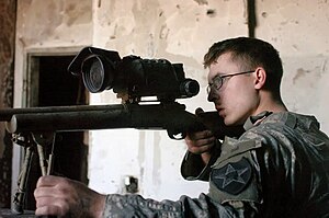 A US Sniper with the 3-2SBCT prepares to fire on insurgent forces, January 24, 2007