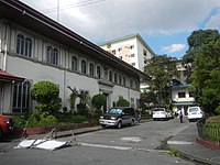 The old municipal hall of San Juan, with the San Juan Medical Center in the background.
