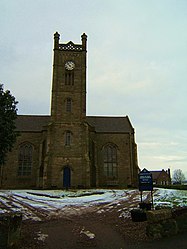 A low shot of Kettle Parish church from the south