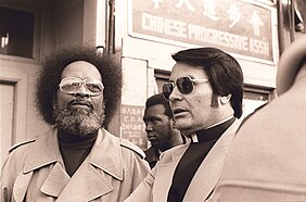 Rev. Cecil Williams with Rev. Jim Jones (1977) at a protest, in front of the International Hotel in San Francisco
